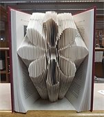 Book folding art of a flower