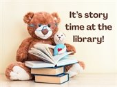 It's story time at the library. A teddy bear with a pile of books.