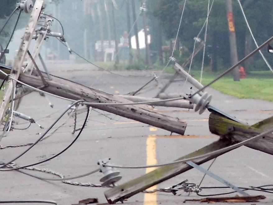 downed-wires-downed-telephone-pole-in-road