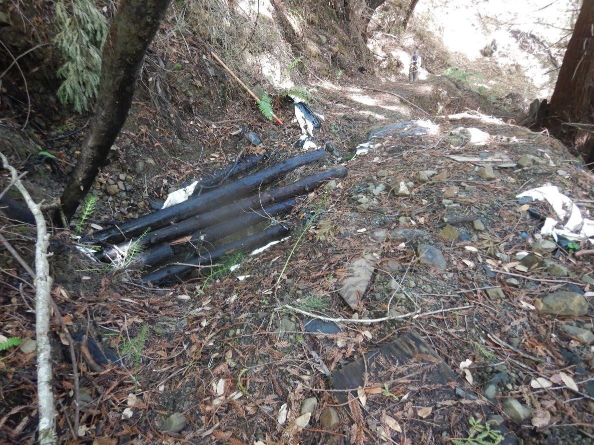 Excavta spring diversion with old plastic, diversion down and erosion of skid road with sediment del