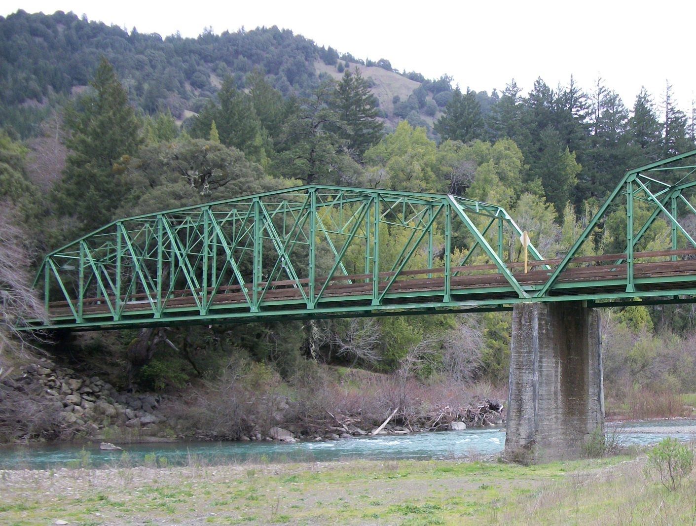 Looking up at the Mattole River bridge, in Honeydew, from the river bed