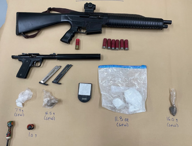 Photo of seized evidence ( Drugs, firearms and drug paraphernalia)