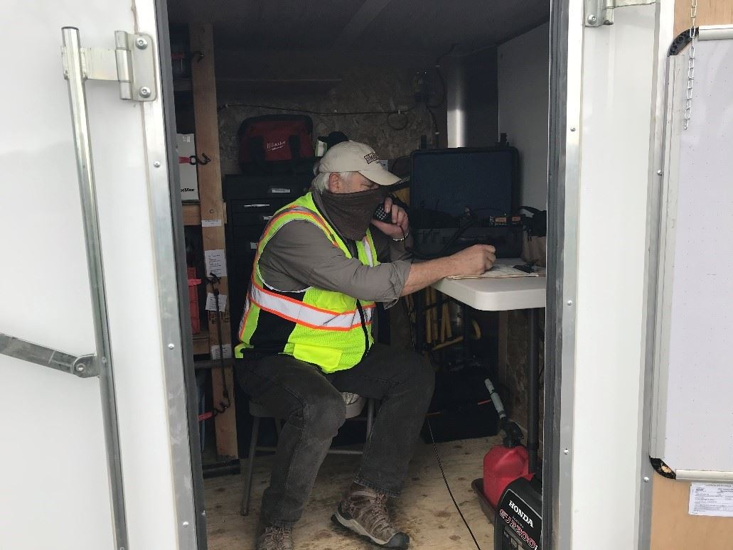 A male volunteer participates in the Auxillary Communication sTeam